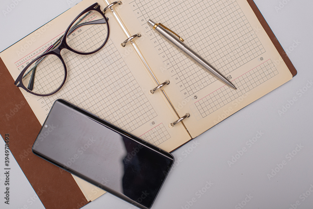 notebook and glasses notebook and glasses