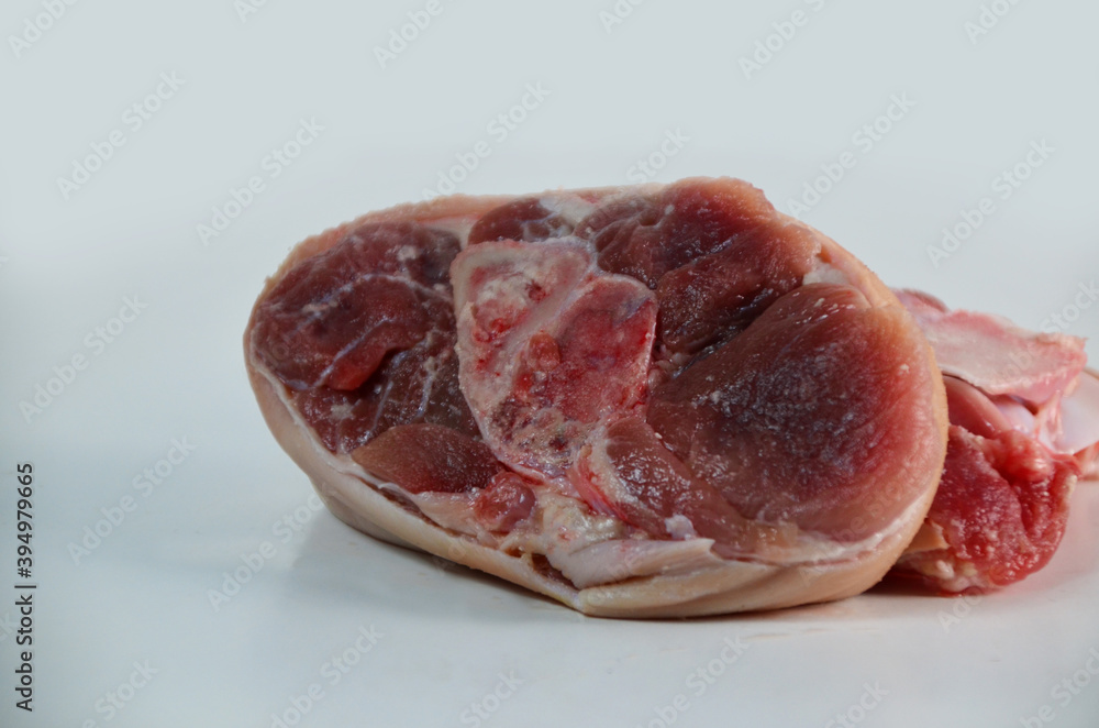 pieces of raw pork steaks, for cooking,on white background. Concept of food preparation. Separated on white background.