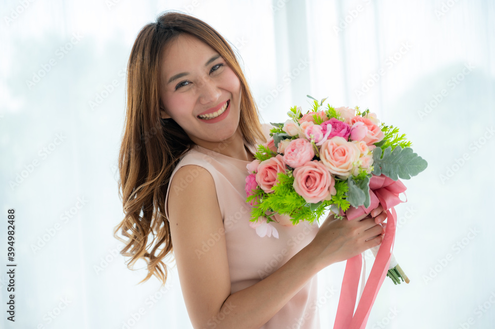 Young asian man asking women for wedding engagement with the ring, present and flower to be the husband and wife Young asian man asking women for wedding engagement with the ring, present and flower to be the husband and wife