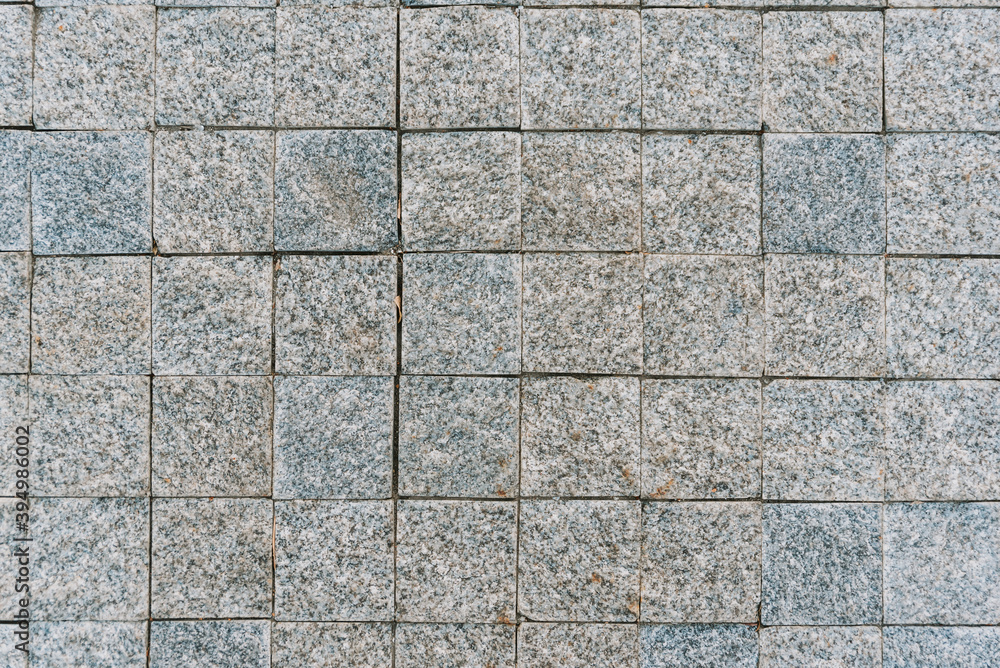 Texture of gray stone paving stones in close-up Texture of gray stone paving stones in close-up