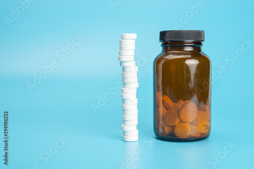 pills spilling out of bottle