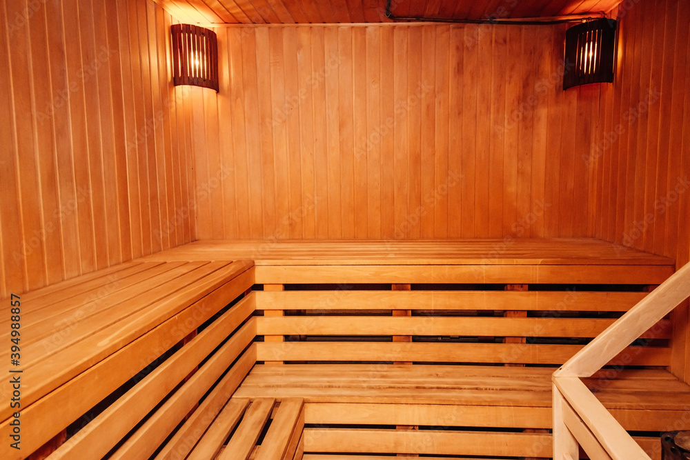 Sauna steam bath inside with stones and stove Sauna steam bath inside with stones and stove