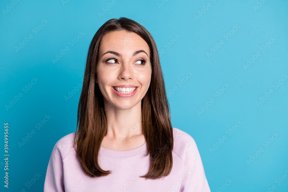 Photo of cute pretty charming young lady wondering look side empty space beaming smiling interested excited have discount all production wear violet pullover isolated blue color background Photo of cute pretty charming young lady wondering look side empty space beaming smiling interested excited have discount all production wear violet pullover isolated blue color background