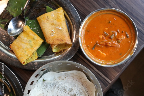 South Indian Dish Dosa Rasam served on Table with Banana Leaf on Plate