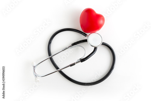 Red love heart and stethoscope on white background. Red heart and a stethoscope. Medical stethoscope and heart isolated on white. Heart, Health care concept.