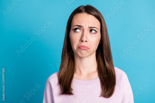 Close-up portrait of her she nice attractive pretty dissatisfied sullen frustrated girl crying overthinking bad news isolated over bright vivid shine vibrant blue color background
