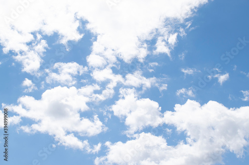 Sky Background. Blue Sunny Sky Covered with White Clouds
