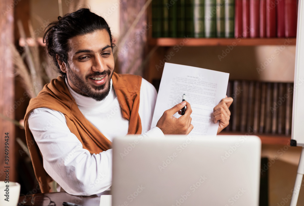 Indian Teacher At Laptop Having Class Teaching Online Sitting Indoors Indian Teacher At Laptop Having Class Teaching Online Sitting Indoors