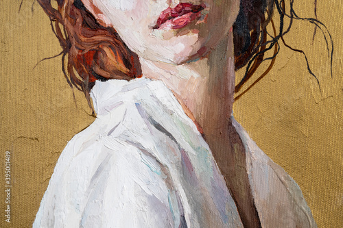 Fototapeta Naklejka Na Ścianę i Meble -  Oil painting. Fragment of  portrait of a  red-haired  girl on a gold background. The art is done in a realistic manner.