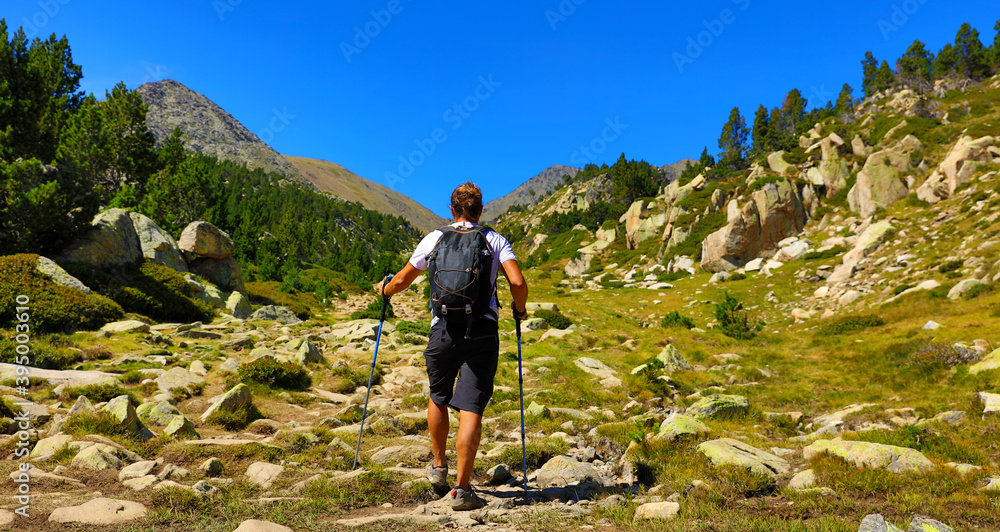 backpacker hiking in Pyrenees- France adventure trekking backpacker hiking in Pyrenees- France adventure trekking