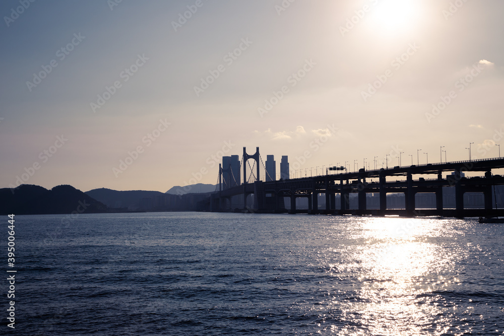 Sunset of Gwangan bridge and blue ocean in Busan, Korea