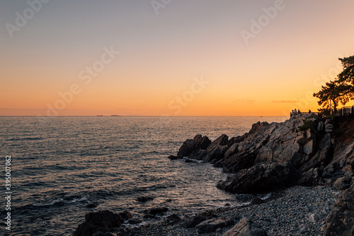 Sunset of Haeundae Dongbaekseom island and sea in Busan, Korea