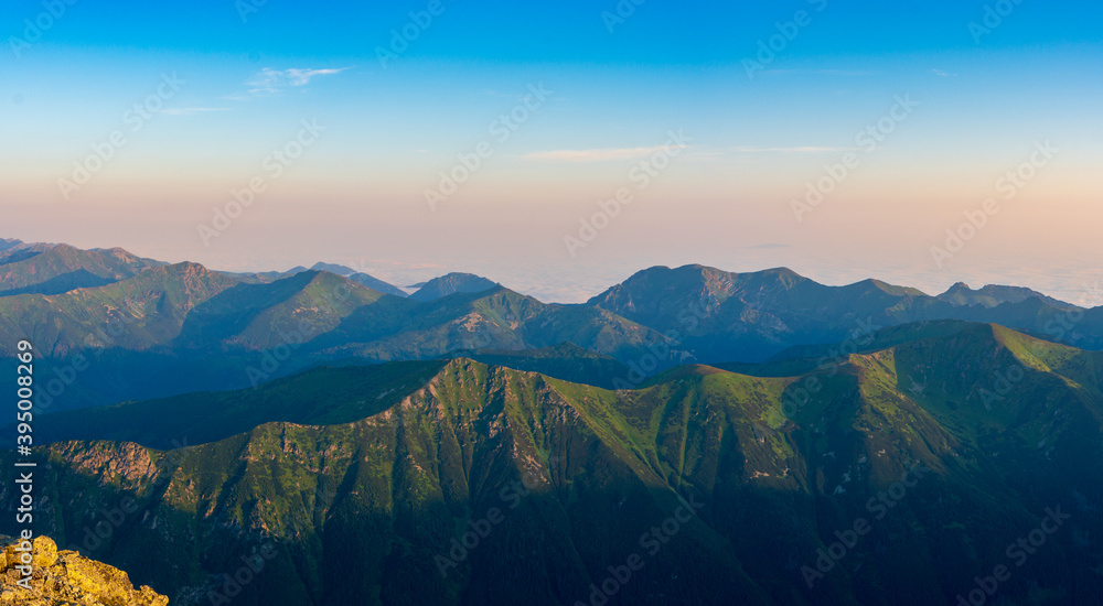 Obraz premium Scenic image of Fairytale mountains during sunrise. The sunrise over a mountain in park High Tatras. Slovakia, Europe. Wonderful Autumn landscape. Picturesque view of nature Amazing natural Background