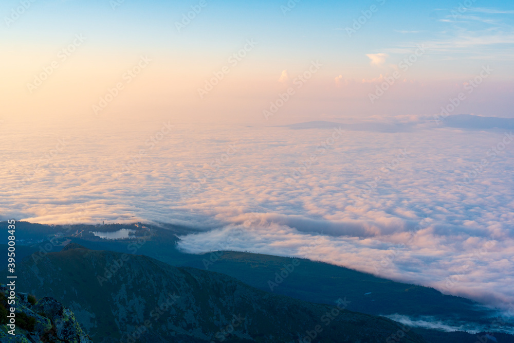 Mountains with Inversion at sunrise as seen From Krivan Peak in High Tatras, Slovakia Mountains with Inversion at sunrise as seen From Krivan Peak in High Tatras, Slovakia