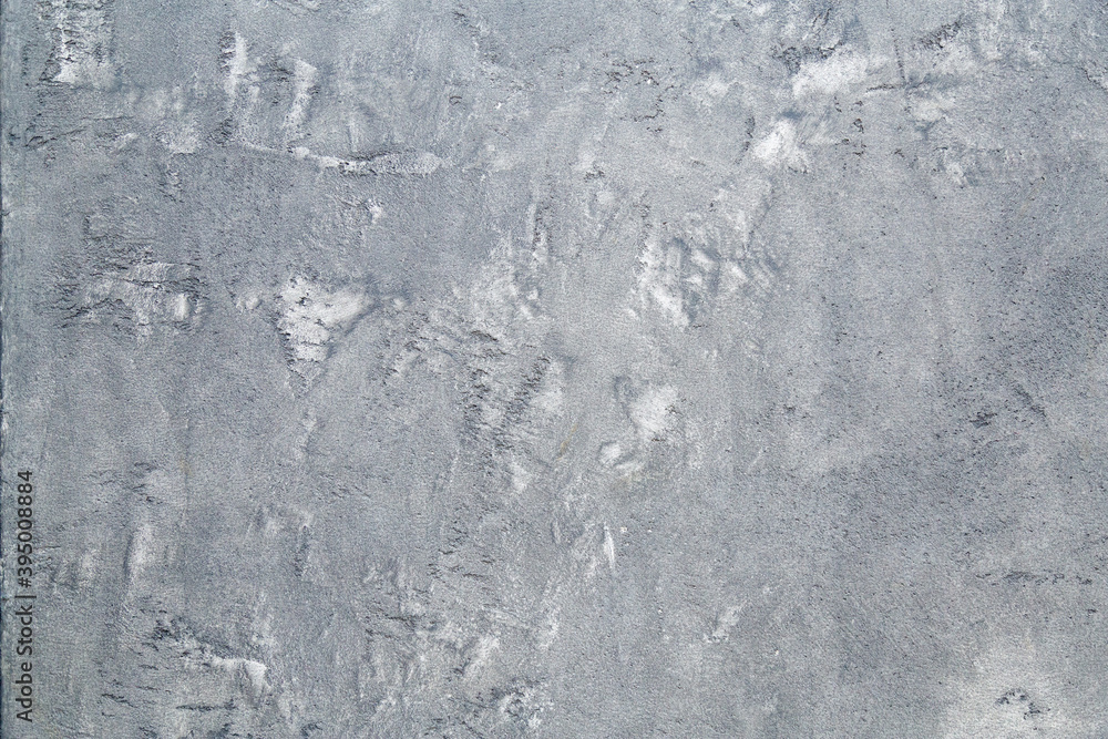 Foto Stock Decorative plaster of grey color with textured smear, wall  surface. Overlay texture for interior or exterior design. Decorative  render. Single-ply monolithic plaster decorative background and sample. |  Adobe Stock