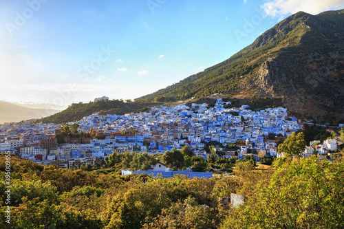 Aerial view of Chefchaouen in Morocco. The city is noted for its buildings in shades of blue and that makes Chefchaouen very attractive to visitors. © Renar