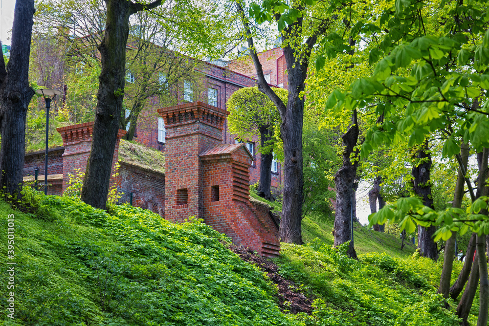 View of the historical red bricks gates on the hill in the Gdansk. Poland. View of the historical red bricks gates on the hill in the Gdansk. Poland.