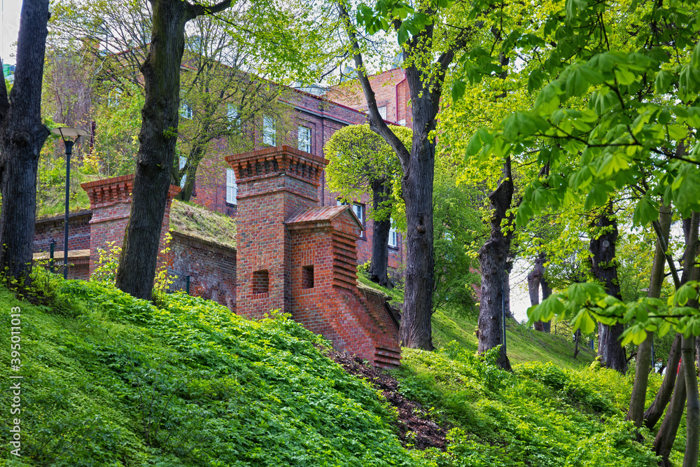 View of the historical red bricks gates on the hill in the Gdansk. Poland.