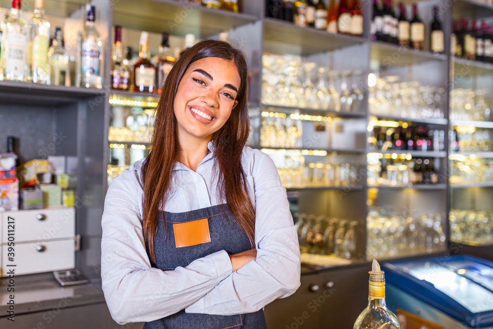 Waitress wearing apron smilling looking at camera. Happy businesswoman. Small business owner of girl entrepreneur. Cafe employee posing in restaurant coffee shop Waitress wearing apron smilling looking at camera. Happy businesswoman. Small business owner of girl entrepreneur. Cafe employee posing in restaurant coffee shop