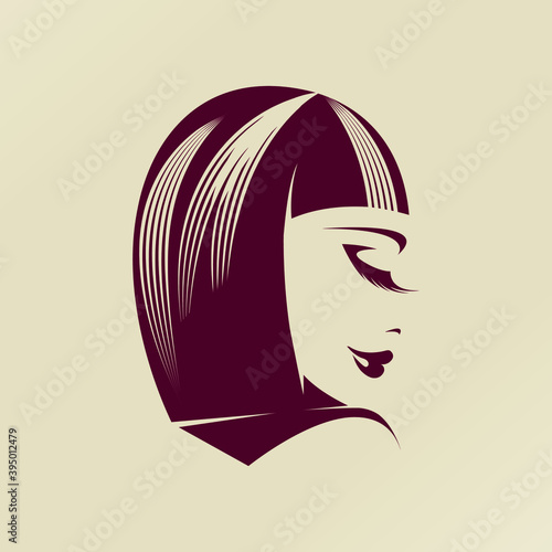 Beautiful woman with elegant hairstyle and makeup.Beauty and hair salon vector logo isolated on light background.Cosmetics studio icon.Retro haircut and long eyelashes.Cute female.Young lady face.