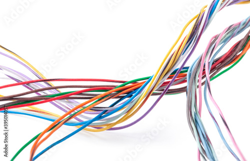 Multicolored cable isolated on white background photo
