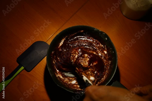 Snow-whipped eggs whiskly beaten with electric flasks and then mixed with chocolate cream for homemade sweet preparation - Timelapse 4k