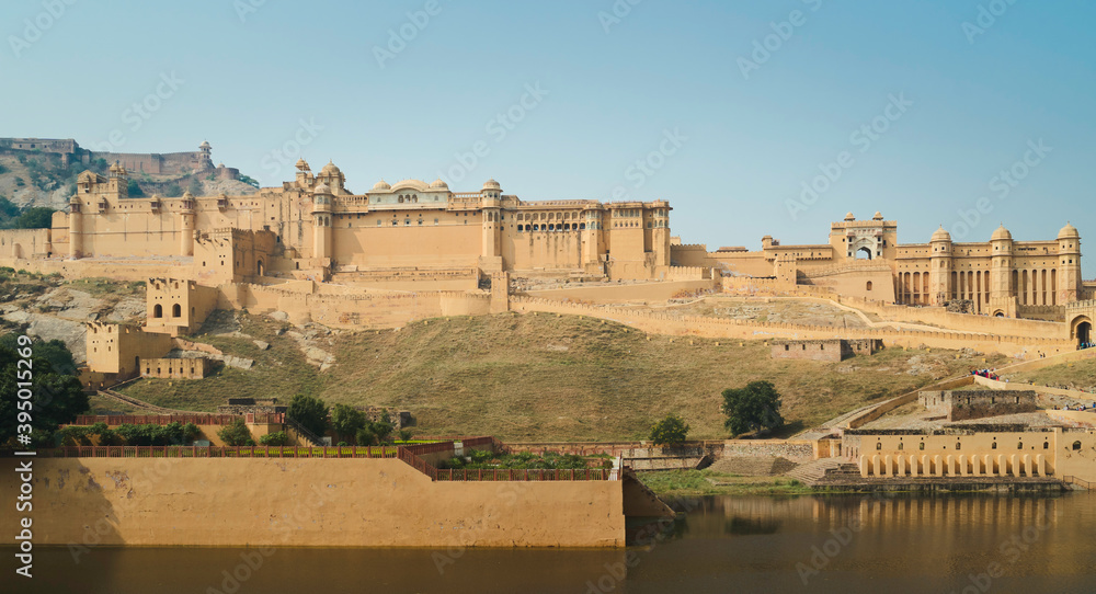 Amer Fort bathed in morning light in summer. Jaipur, India.