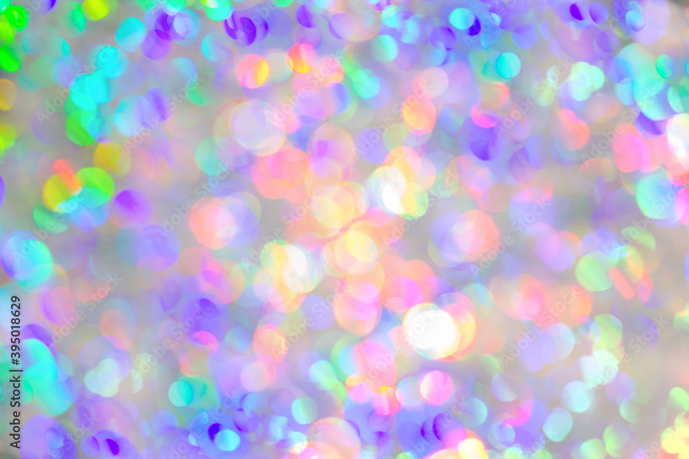 Blurred positive colorful festive background, round lens flares