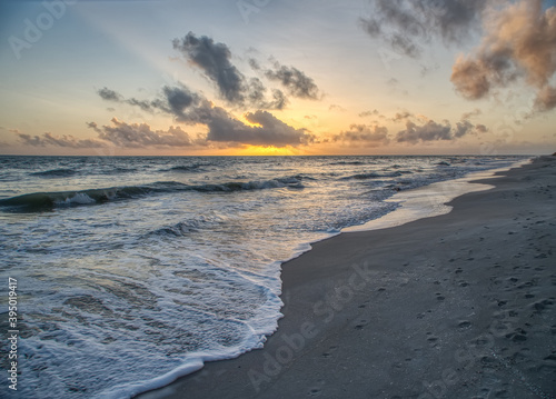 Fototapeta Naklejka Na Ścianę i Meble -  Sunset oiver the Gulf of Mexico from Sanibel Island Florida in the United States