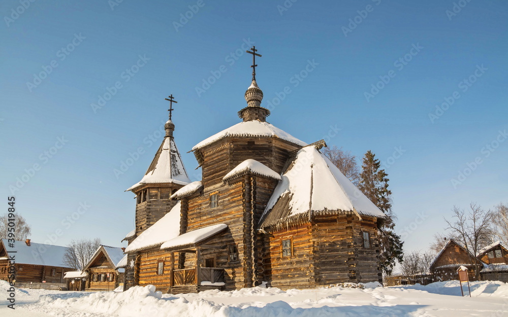 Gold ring of Russia. Old log church in winter Suzdal Gold ring of Russia. Old log church in winter Suzdal