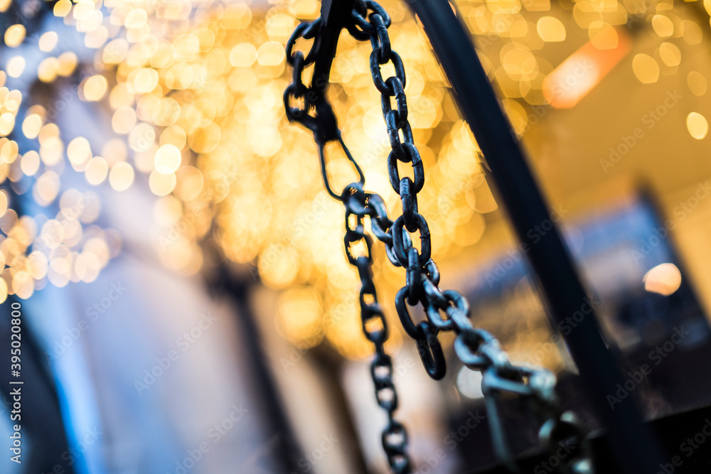 Hanging chains with massive bokeh.