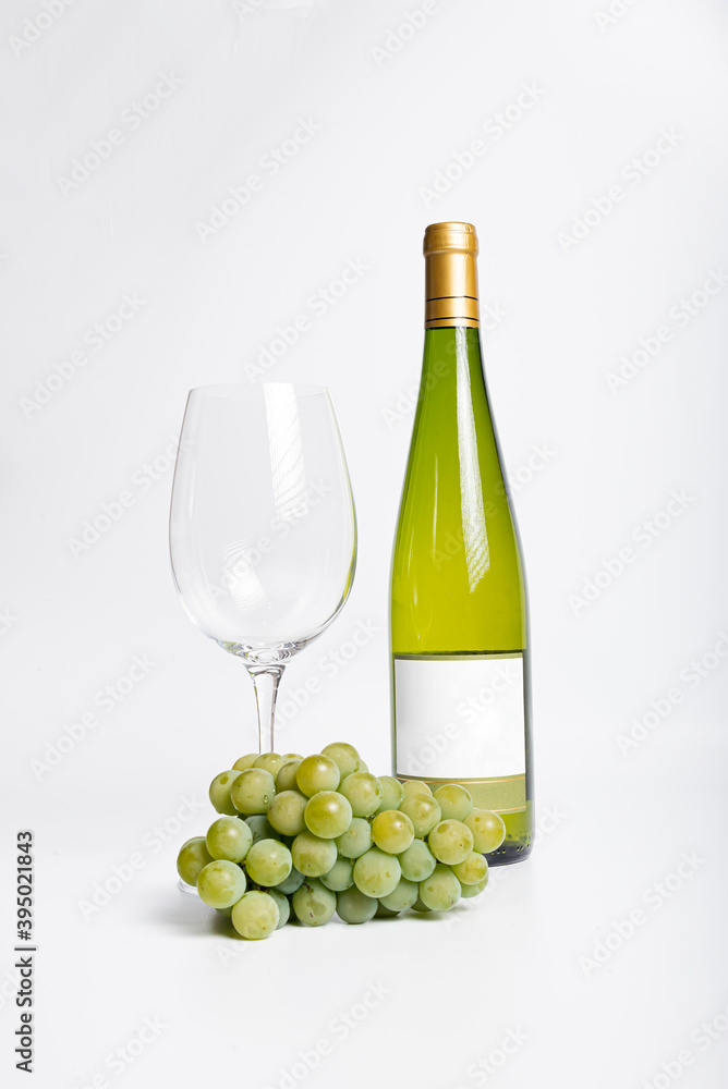 Wine bottle and two wine glasses. Wine bottle against a white background Wine bottle and two wine glasses. Wine bottle against a white background