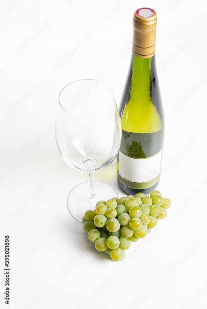 Wine bottle and two wine glasses. Wine bottle against a white background Wine bottle and two wine glasses. Wine bottle against a white background
