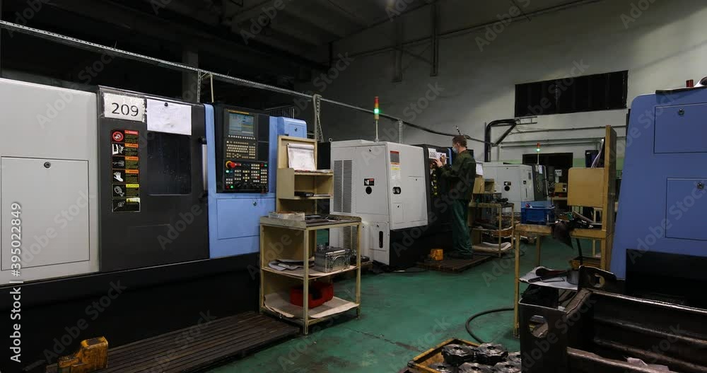 Minsk, Belarus - November 24, 2020: production of auto parts. Modern Assembly at the plant. The automated build process Minsk, Belarus - November 24, 2020: production of auto parts. Modern Assembly at the plant. The automated build process