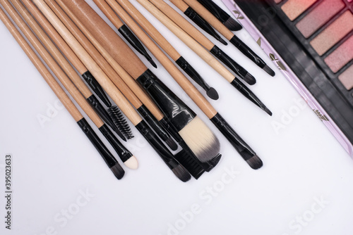 Makeup brushes put on background,