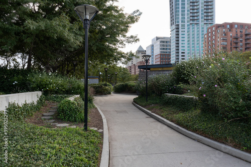 Empty Trail at a Park on the Hoboken New Jersey Riverfront with Skyscrapers and Green Trees