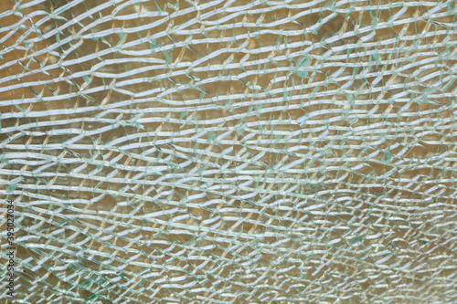 Close up of textured photos, broken glass