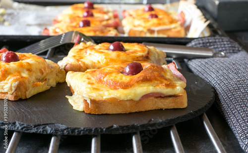 grilled Toast Hawaii with ham, cheese, pineapple and cherry