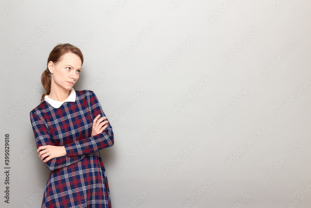 Portrait of thoughtful holding arms folded and being deep in thoughts Portrait of thoughtful holding arms folded and being deep in thoughts