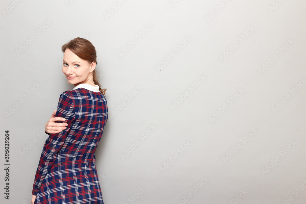 Portrait of happy girl turning around and smiling joyfully Portrait of happy girl turning around and smiling joyfully