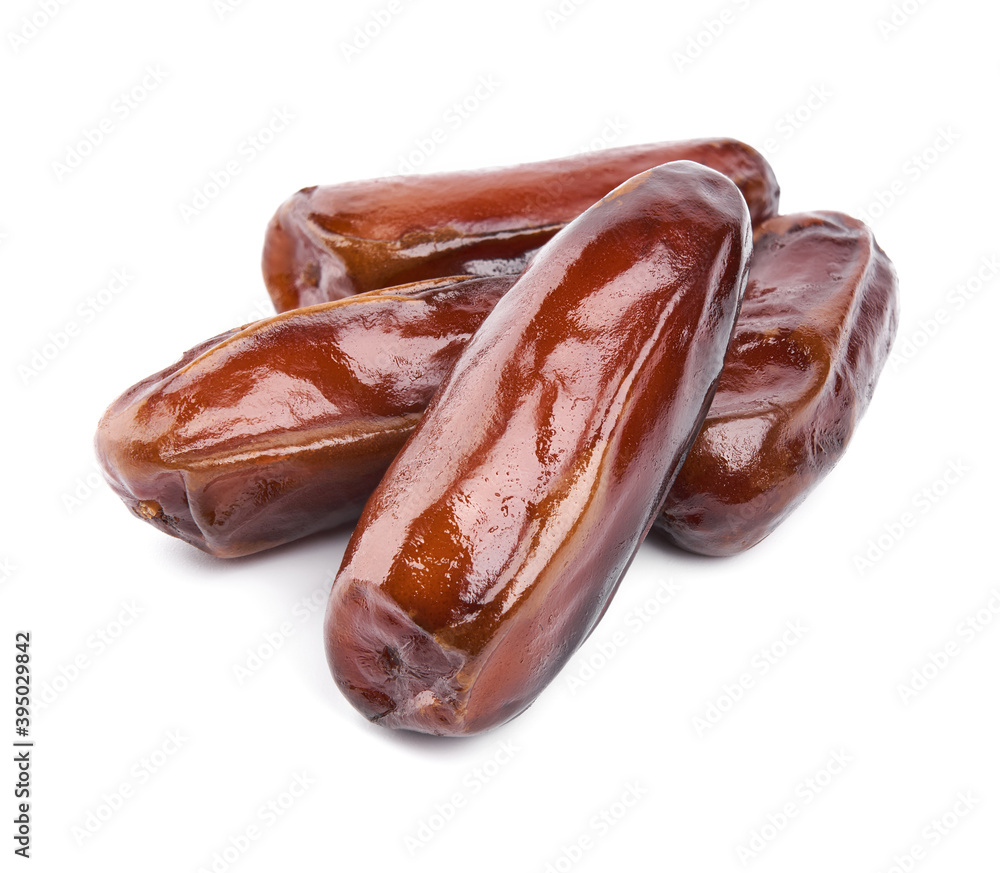 Creative layout made of dried dates. Flat lay. Food concept. Fruits dates. Dates Palm fruit isolated on white. Dried fruits. Healthy diet. Creative layout made of dried dates. Flat lay. Food concept. Fruits dates. Dates Palm fruit isolated on white. Dried fruits. Healthy diet.