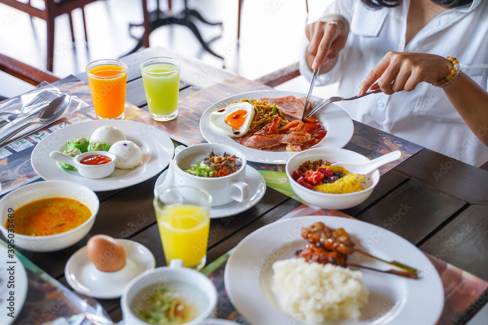 eat set of breakfast at restaurant eat set of breakfast at restaurant