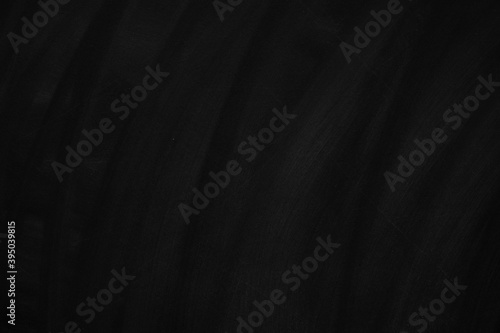 Abstract texture of chalk rubbed out on green blackboard or chalkboard background. School education, dark wall backdrop or learning concept. © tonstock
