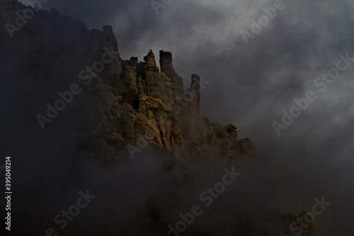 Dark clouds and fog surround spires on Mount Lemmon in Arizona © F&J McGinn
