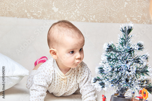 the kid first saw a plastic Christmas tree