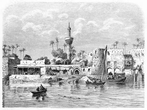 Arabian countryside and buildings in Hillah on the bank of the Euphrate river, Iraq. Ancient grey tone etching style art by Flandin and Maurand, Le Tour du Monde, Paris, 1861 photo