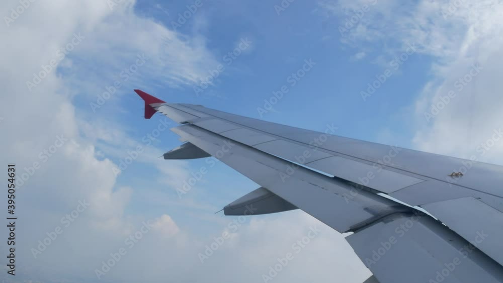 Sky from airplane with wing fly over cloud Sky from airplane with wing fly over cloud