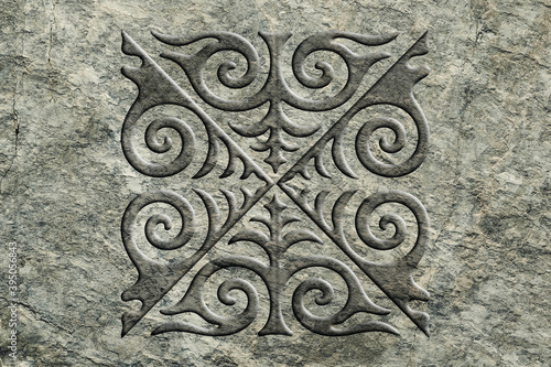 Ornamental print on the stone surface. Vintage ornament on the stone. Close-up seamless texture. Stone texture. Pattern on the stone. Embossed pattern. Wallpaper.