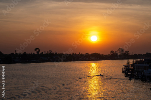 Beautiful Sunset View of Koh Kred at Rama IV bridge cross the Chao Phraya River in Park Kred, Nonthaburi province, Thailand photo