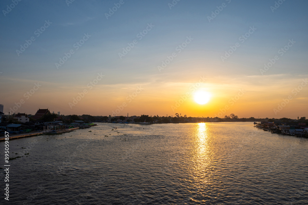 Beautiful Sunset View of Koh Kred at Rama IV bridge cross the Chao Phraya River in Park Kred, Nonthaburi province, Thailand